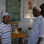 Haji Shaffien and imam (left) at the entrance of the Masjid Jamek in Shwekyin, Myanmar